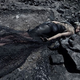 Illustration for article titled Vogue Italia's Awful Oil Spill Fashion Shoot